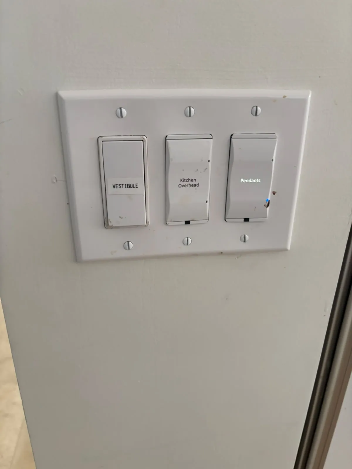 Labeled wall keypads for programmed scenes